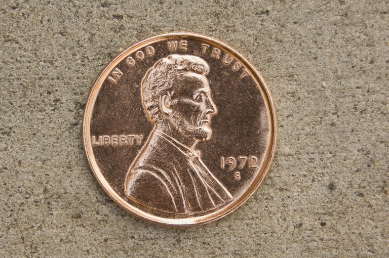 Penny on a sidewalk