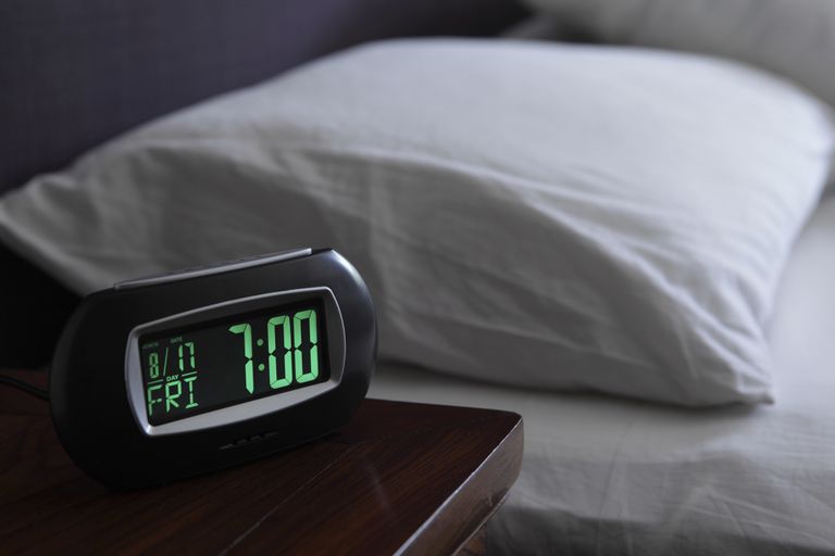Larm clock near bed