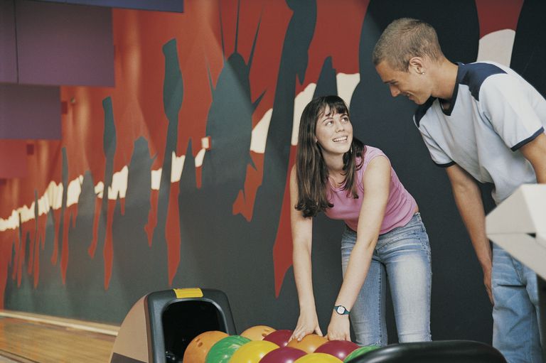 adolescență Couple in a Bowling Alley Playing Tenpin Bowling