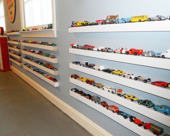 किताब ledges repurposed as toy car storage for kids