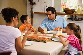 A family meeting over pizza