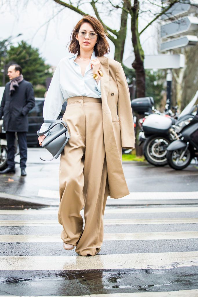 Ulica style woman in wide leg trousers