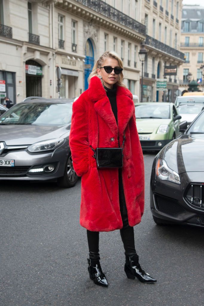 Gata style in red faux fur coat