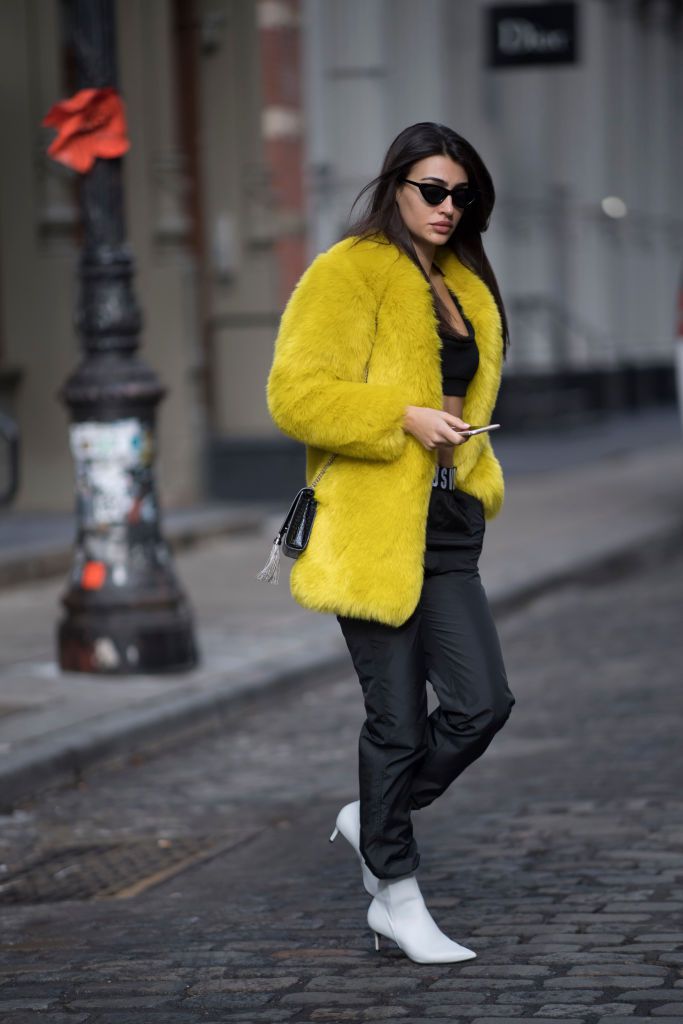 Gata style in yellow faux fur coat