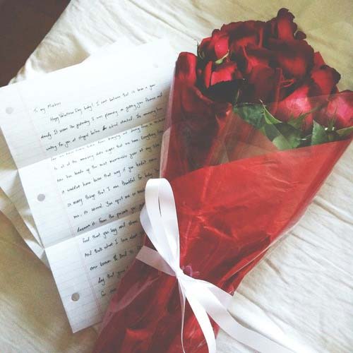 Handwritten Letter and Roses