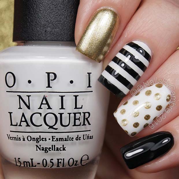 Svart and Gold Nails with Stripes and Polka Dots
