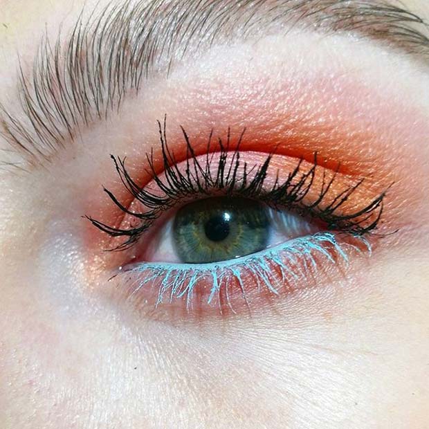 साहसिक Orange Eye Shadow and Blue Mascara Makeup Idea for Spring 