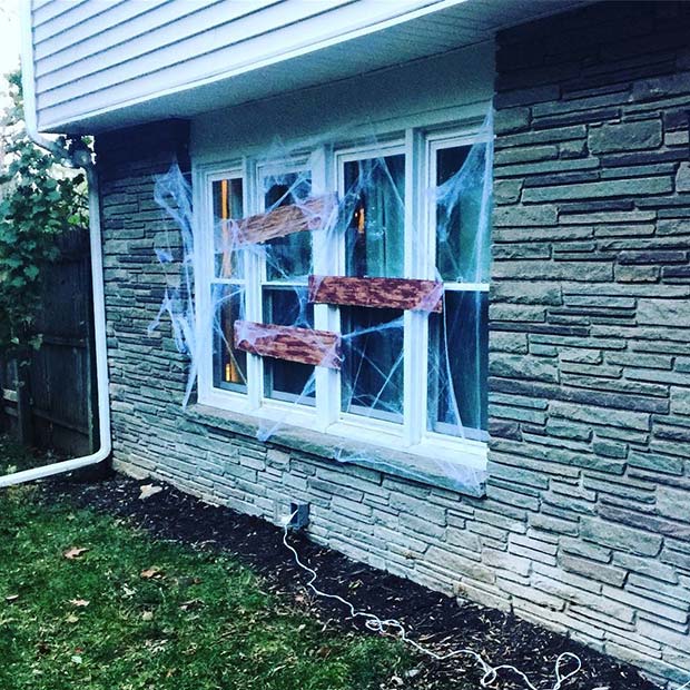 boarded Up Haunted House Windows for DIY Halloween Decor 