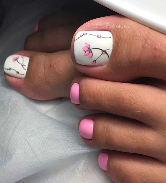 Pembe and White Floral Toe Nail Design 