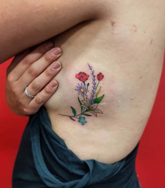 Renkli Floral Rib Tattoo Idea