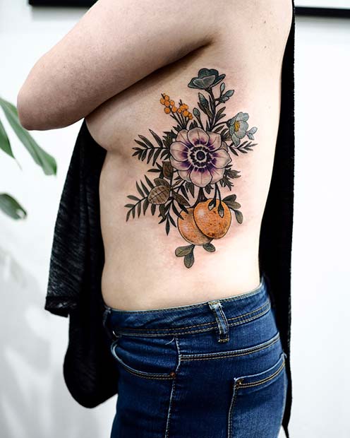 Artistic Flower and Fruit Rib Tattoo Design 