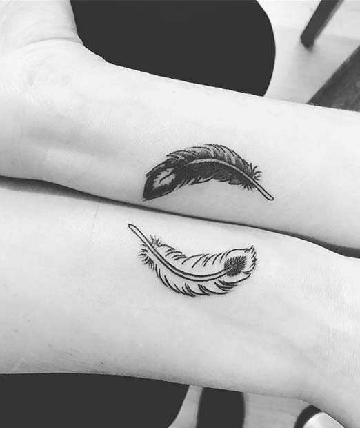 יְצִירָתִי Yin and Yang Feathers Tattoo Design 