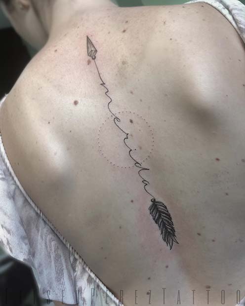 Nežno Personalized Arrow Tattoo Design on Back