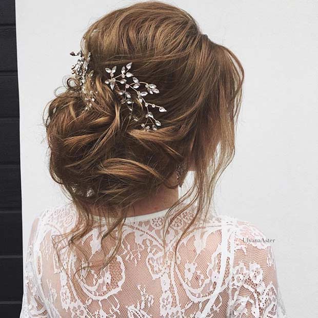 Elegant Updo Wedding Hairstyle with a Hairpiece