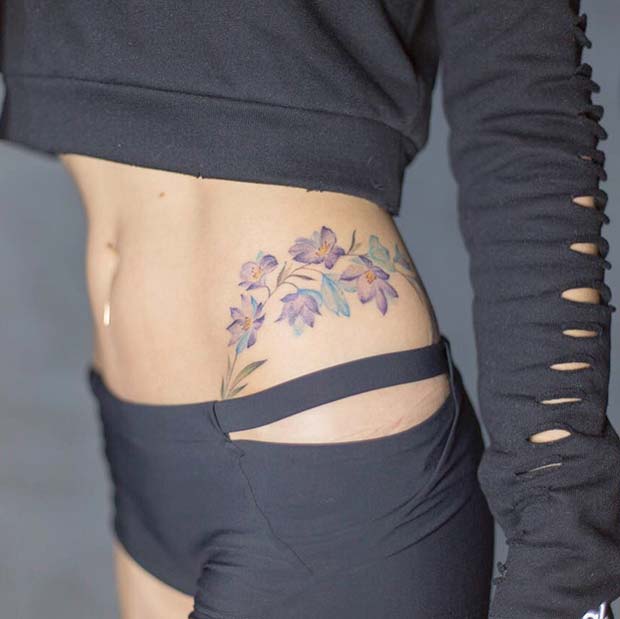  Pretty Hip Floral Tattoo