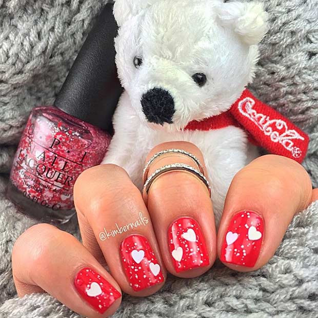 Röd and Silver Hearts Nail Design for Valentine's
