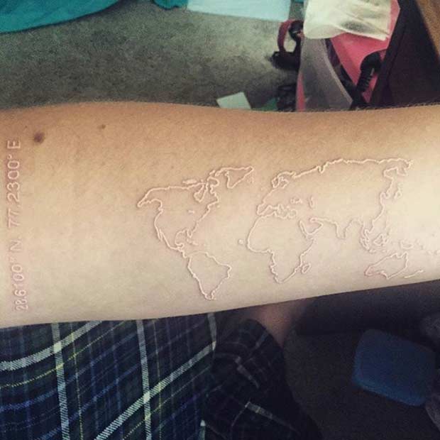 Beyaz Ink World Map Tattoo