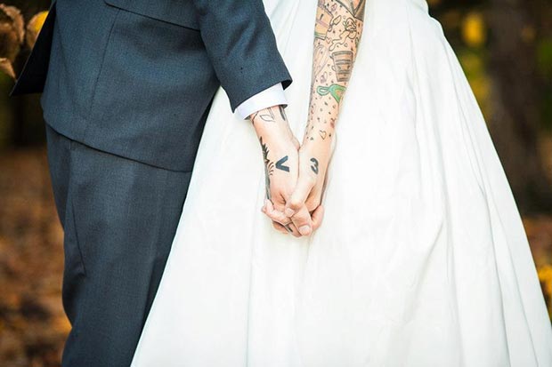 Matching Arm Heart Couple Tattoos