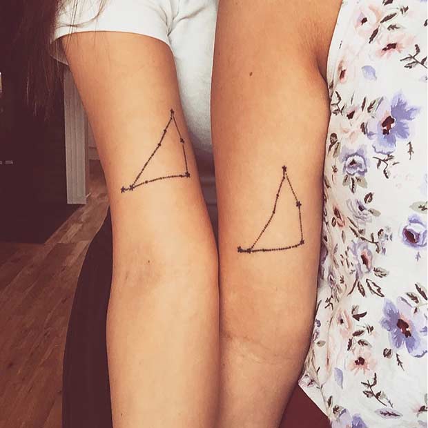 Matching Capricon Constellation Tattoos for Twin Sisters