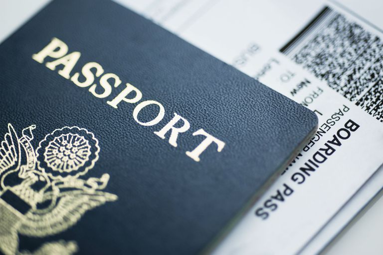 अमेरिकन passport with boarding pass inside