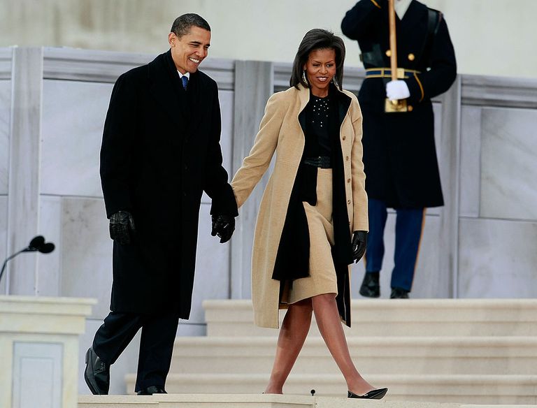 Barack and Michele Obama holding hands