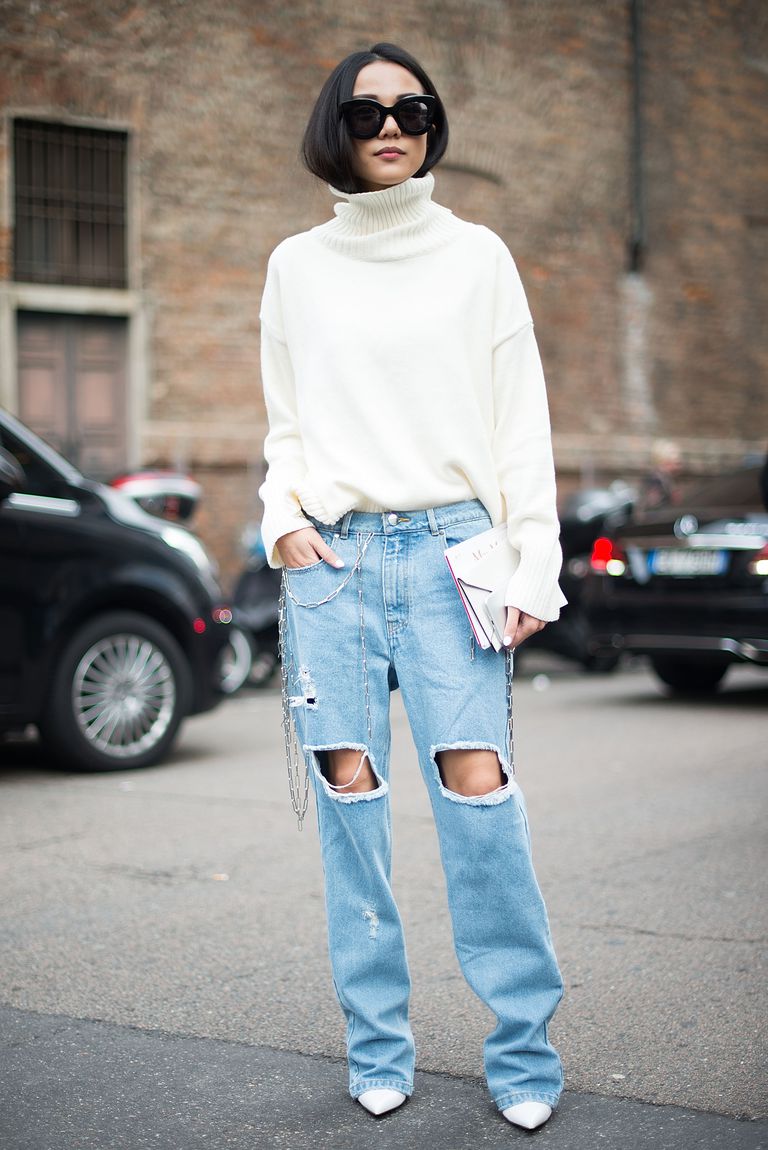 Ripped jeans and sweater street style photo