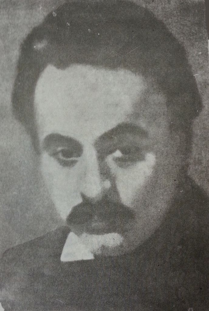 א Photograph of the face of Khalil Gibran