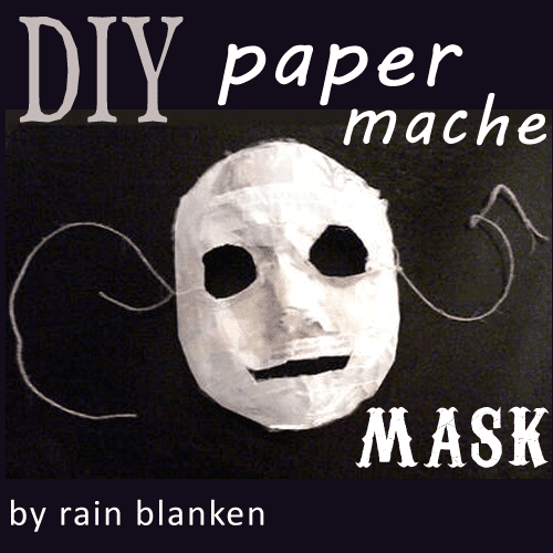 направити a paper mache mask
