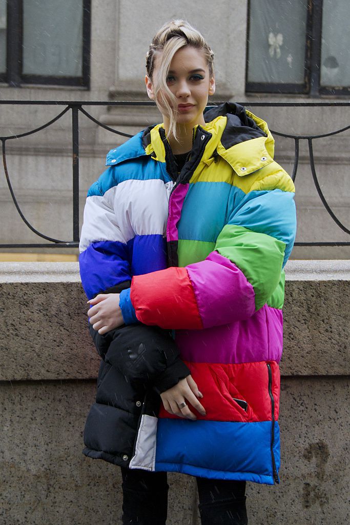 utca style in puffer coat in rainbow stripes