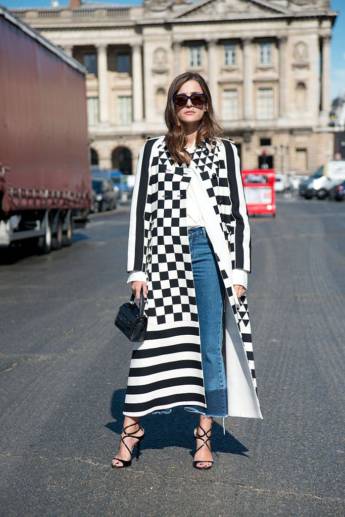 Ulica style in jeans and a graphic coat