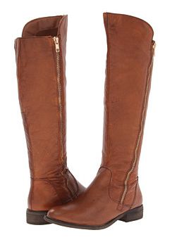 Талл, cognac boots with simple, classic styling and full side zippers.