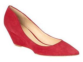 Поинти-тоед pumps with red suede uppers, and mid-height, covered wedge heels.