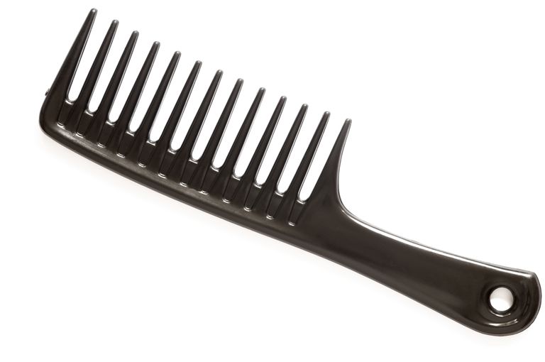 א wide tooth comb is a good tool for black hair.