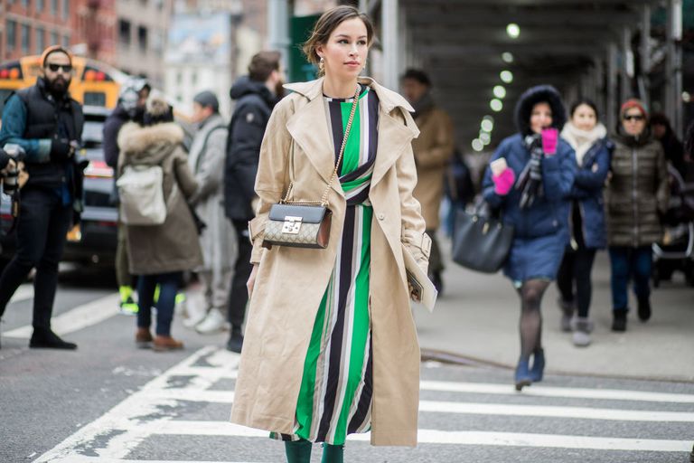 Ženska in striped dress and coat