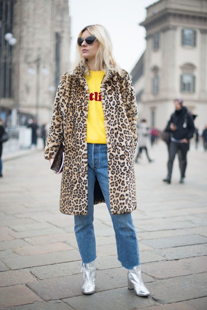 Gata style in leopard print coat and raw hem jeans